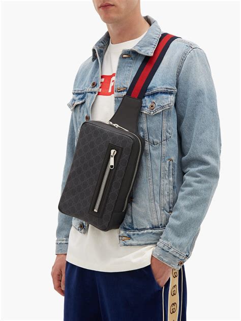 gucci supreme crossbody bag.